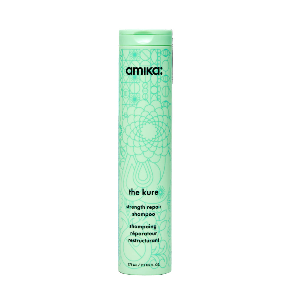 Amika shampoo bottle with green label on a white background