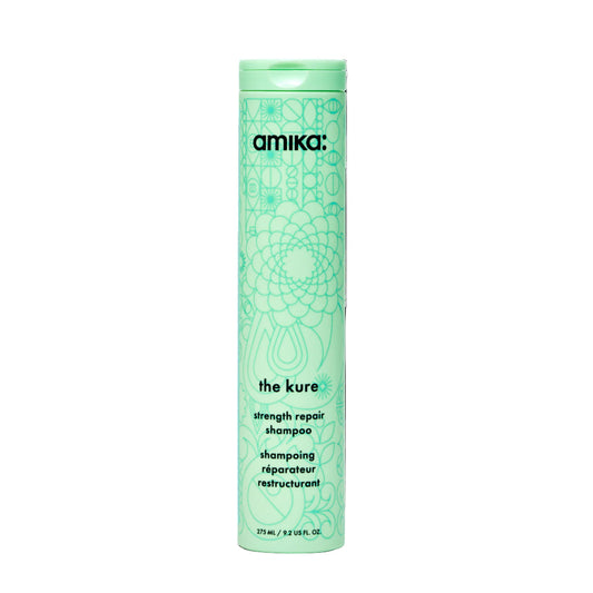 Amika shampoo bottle with green label on a white background